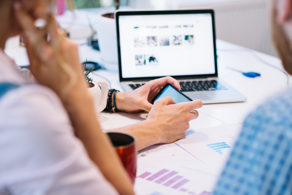 People working with technology and data